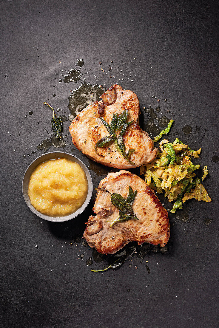 Pork chops with Savoy cabbage and apple compote