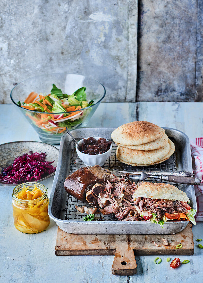 Pulled pork burger with red cabbage salad and mango chutney