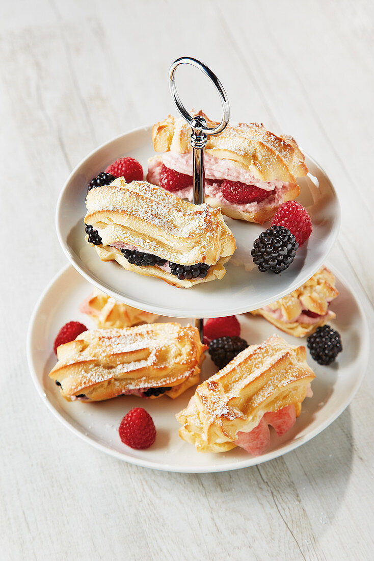 Eclairs with a trio of fruit cream