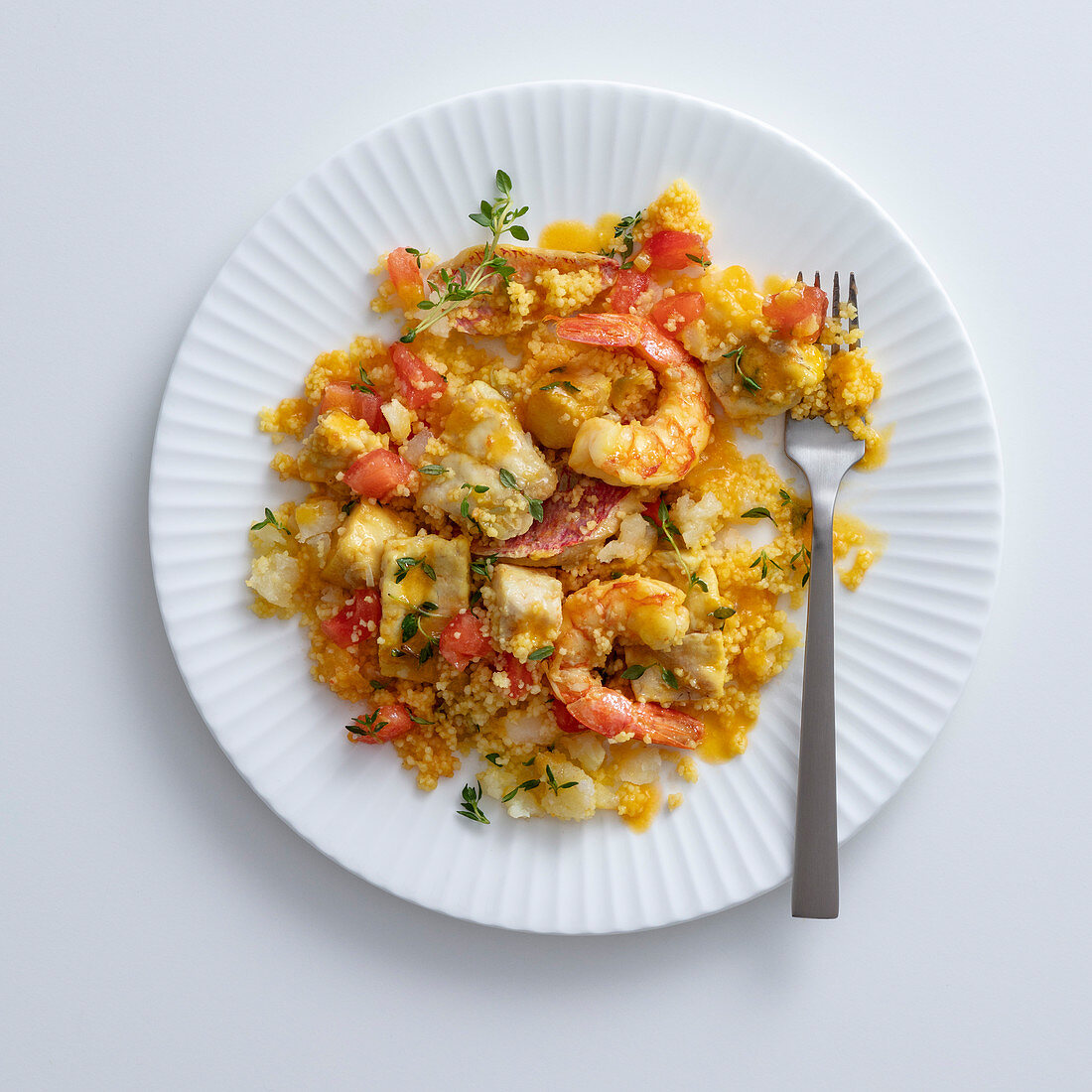 Couscous with fish and prawns