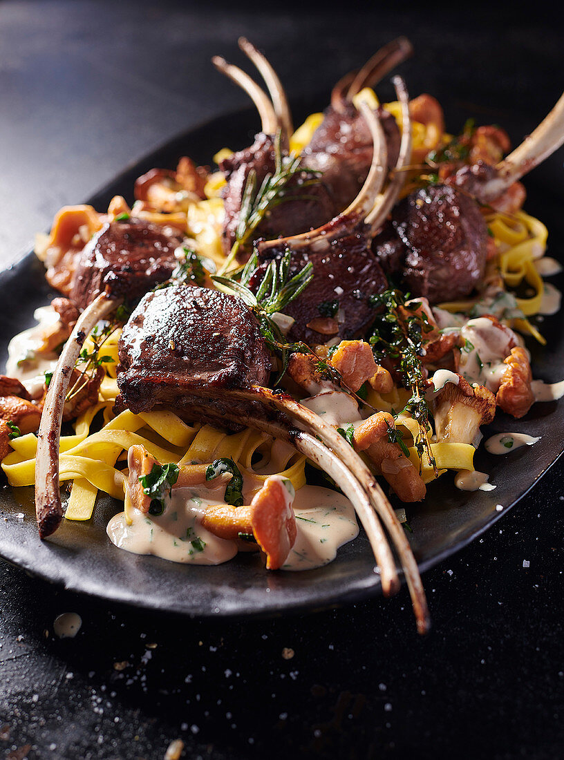 Herb venison chops with tagliatelle and creamy chanterelle mushrooms