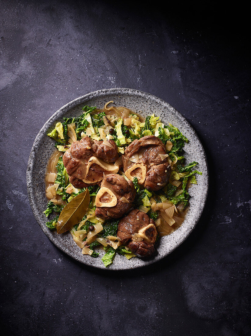 Venison osso buco on a savoy cabbage medley