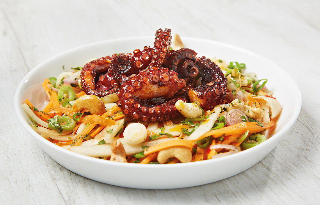 Fried octopus with a papaya salad