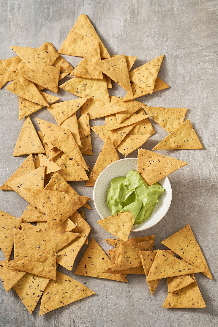 Chickpea flour tortilla chips with guacamole