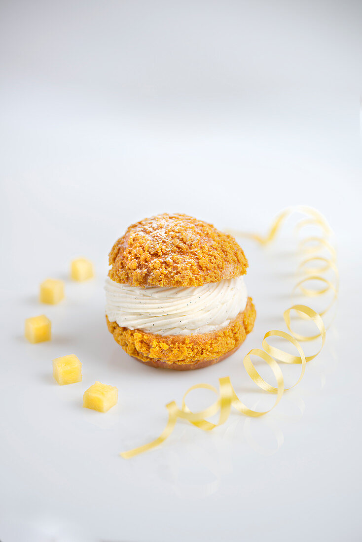 Classic French Choux au Craquelin with a piped vanilla cream