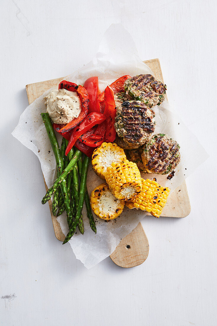 Feta and mint beef patties with grilled vegies and hummus