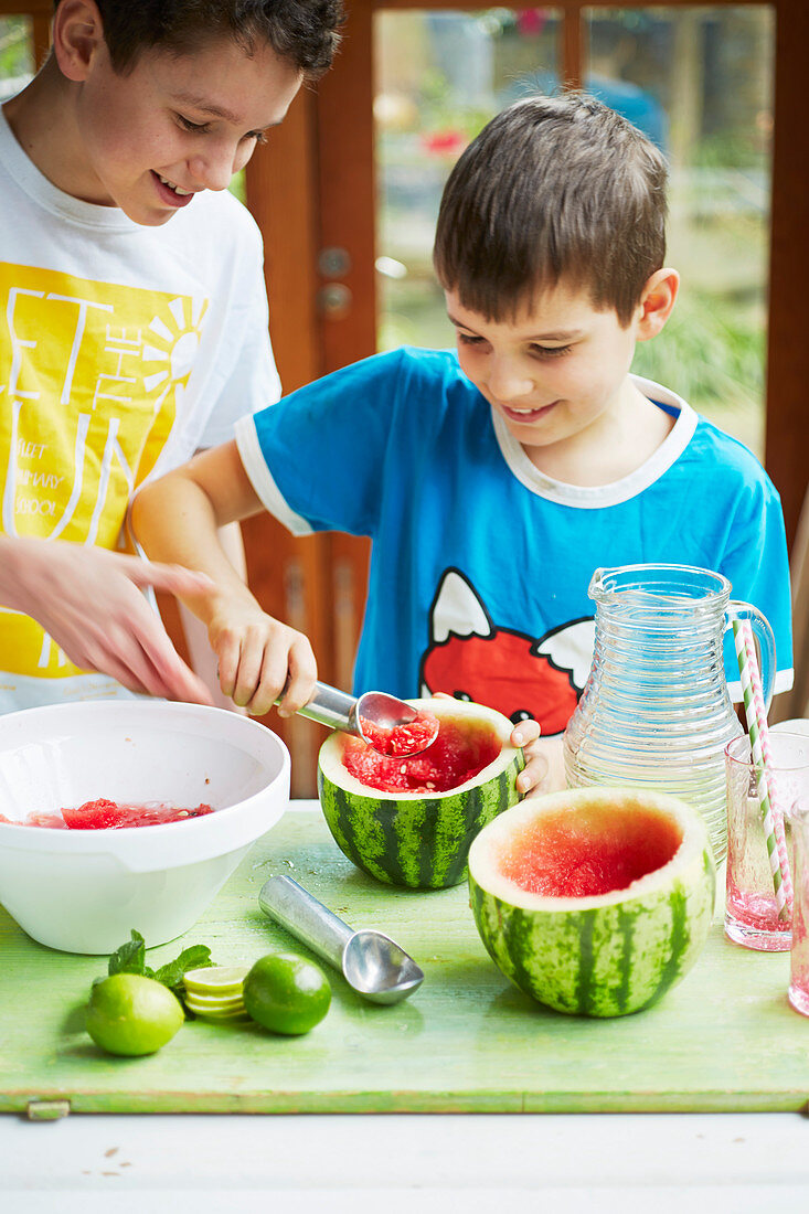 Kids preparing watermelon