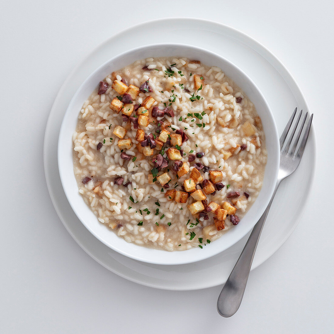 Risotto with roasted Jerusalem artichoke and olives