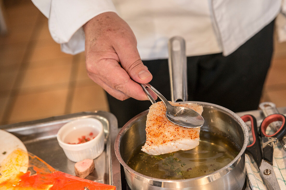 Preparing fried halibut