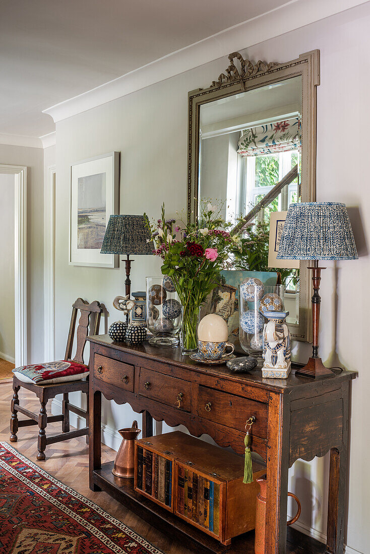 Antique wooden sideboard and lamps