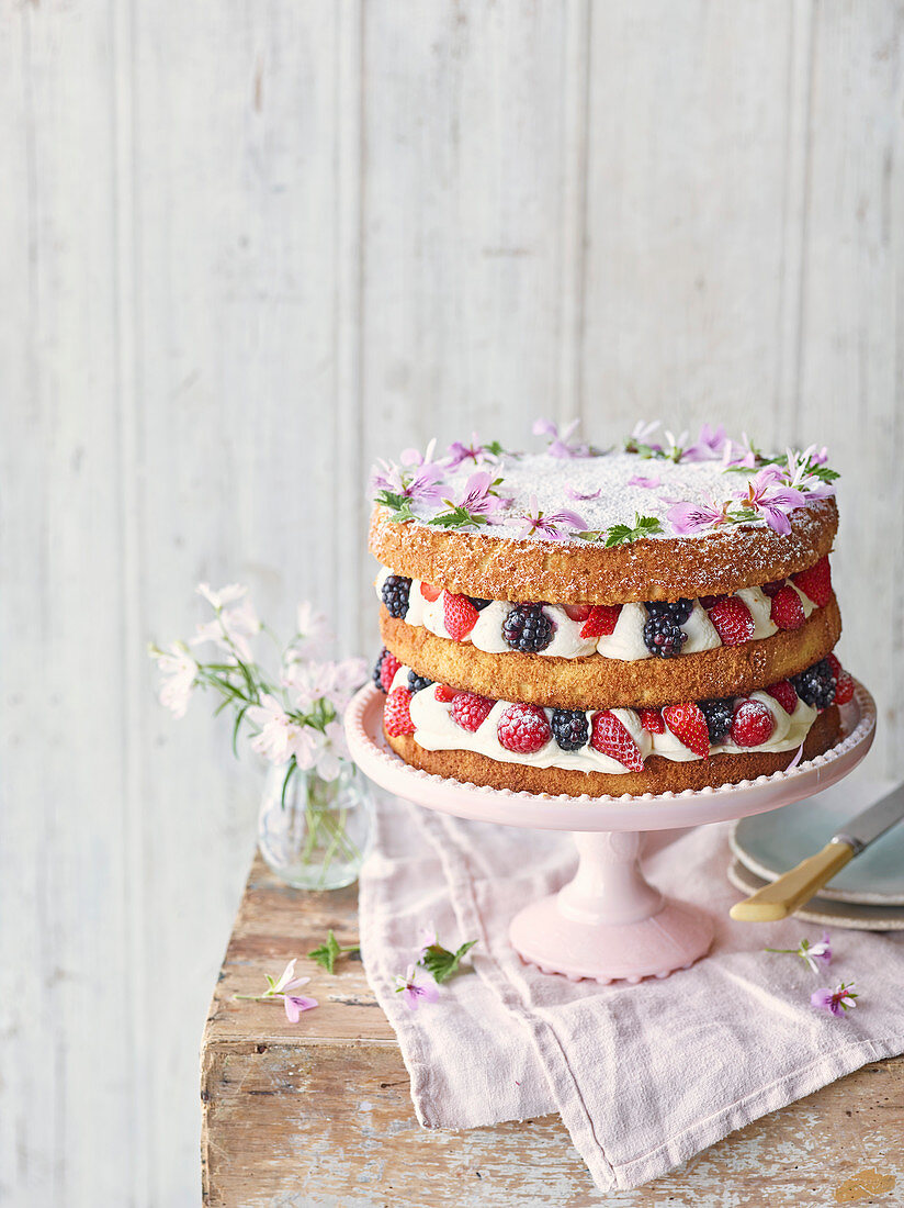 Summer berry cake with rose geranium cream