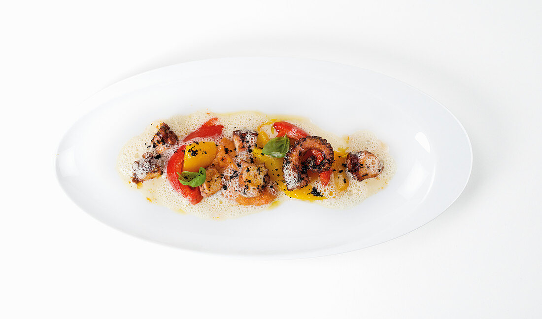 Fried octopus with mignonette sauce and tomato polenta