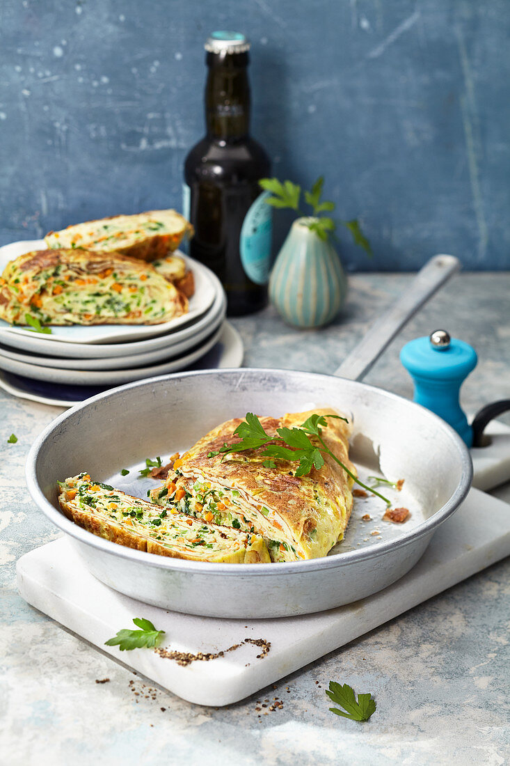 Rolled omelette with a chive dressing