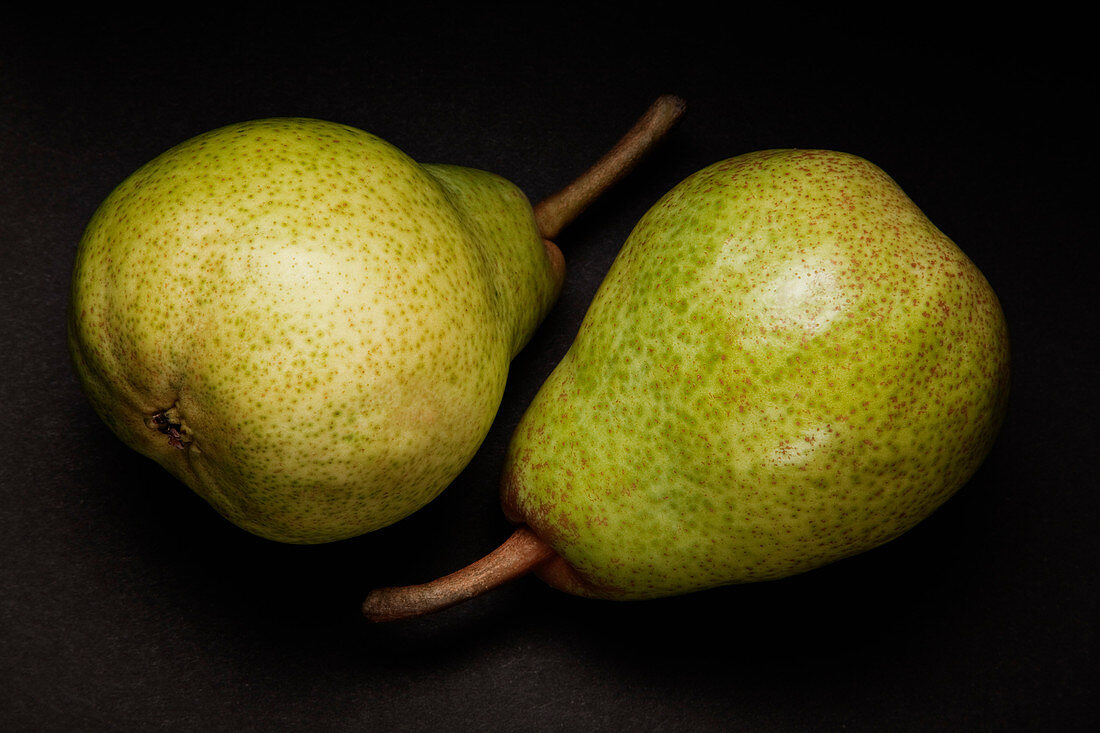 Close up of two green pears