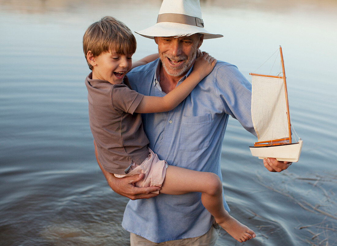 Smiling grandfather and grandson