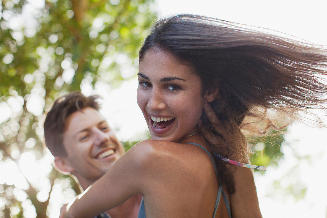 Close up of man spinning girlfriend