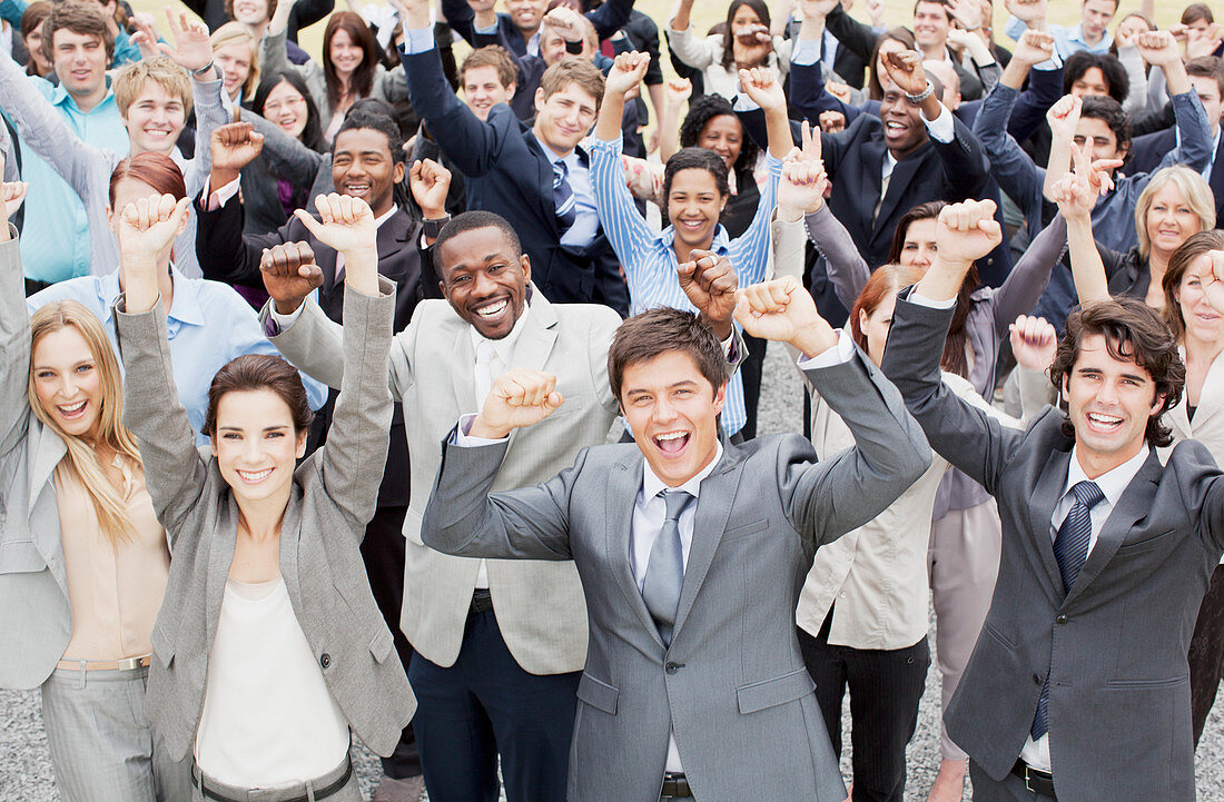 Portrait of business people cheering