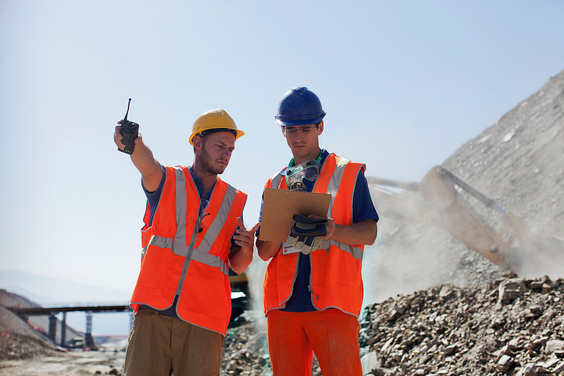 Workers talking in quarry