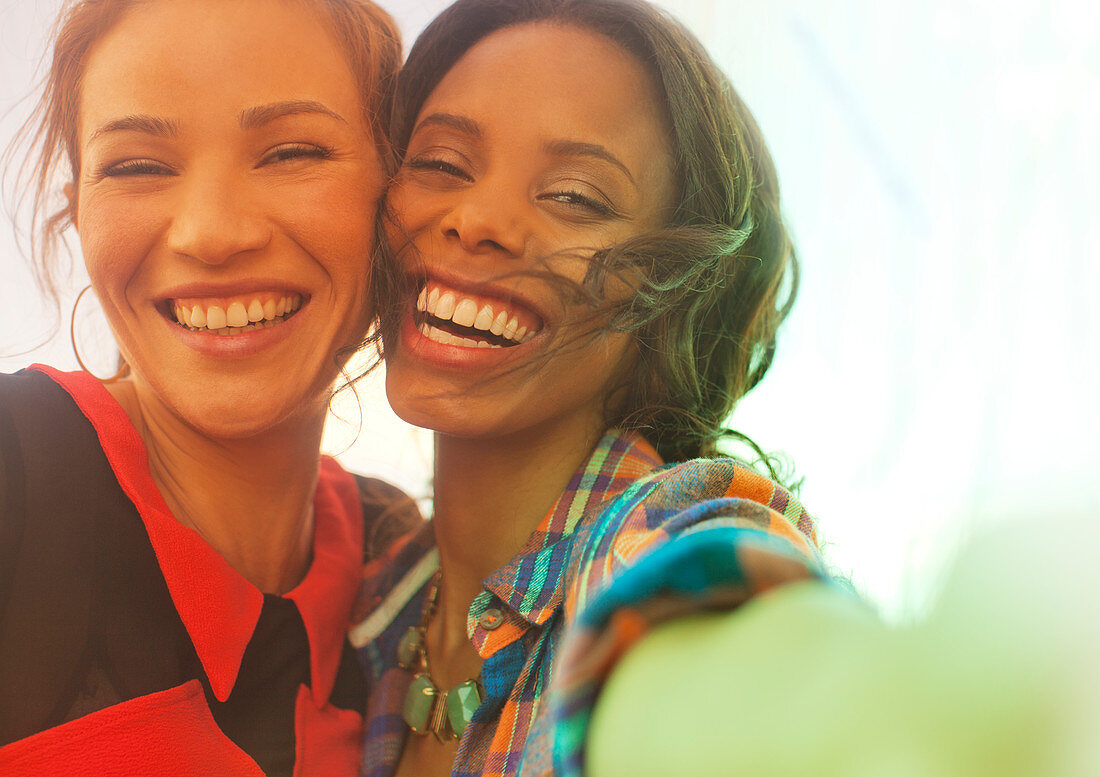 Women smiling together outdoors