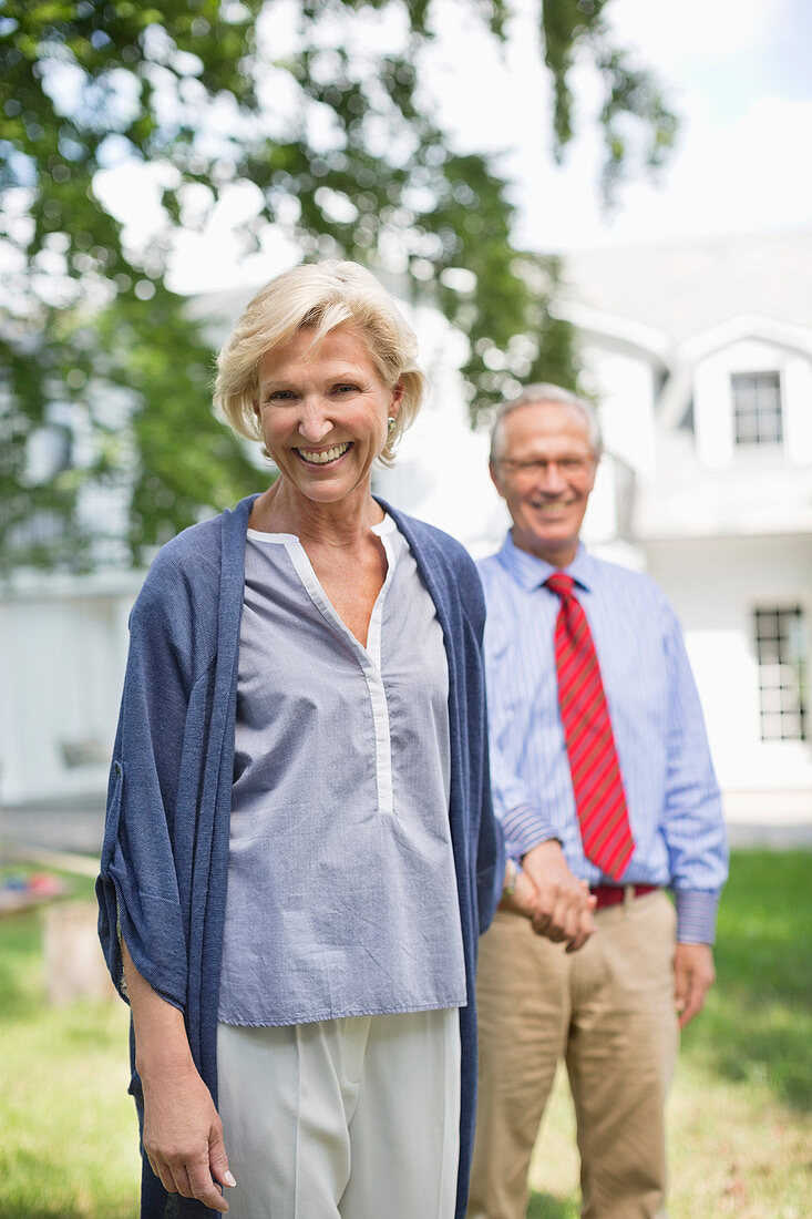 Smiling couple walking outdoors