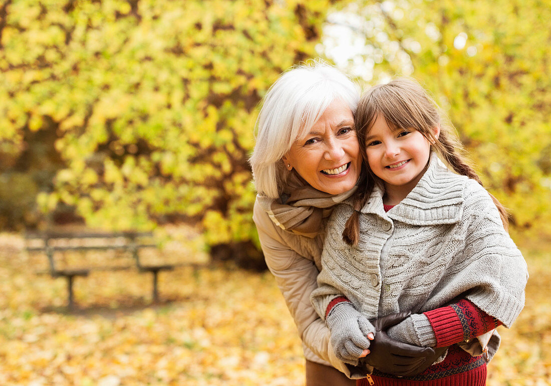 Grandmother and granddaughter in park