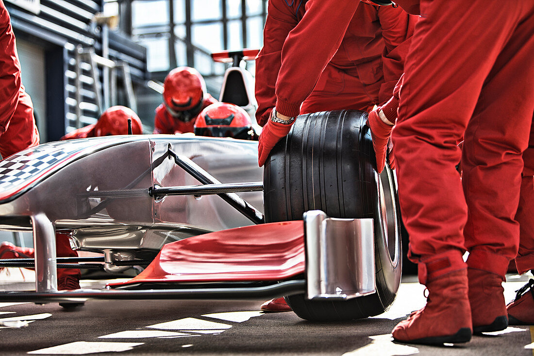 Racing team working at pit stop