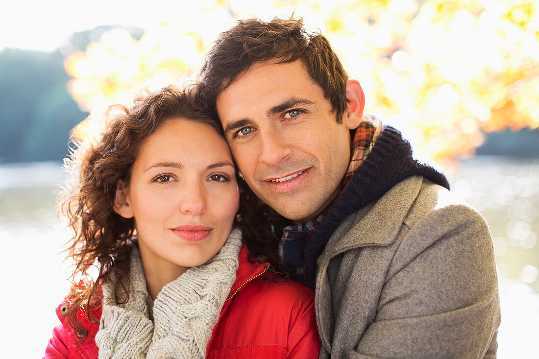 Couple hugging in park