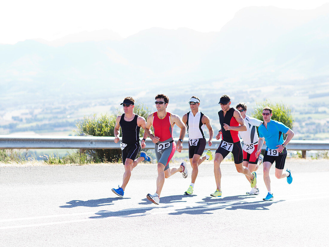 Runners in race on rural road