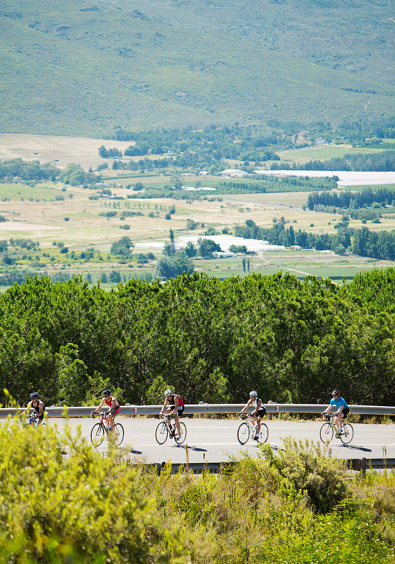 Cyclists in race on rural road