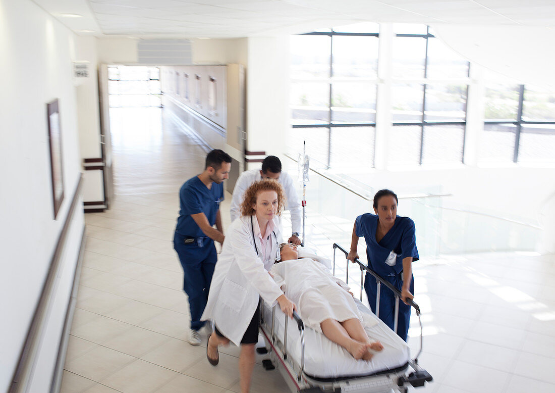 Hospital staff rushing patient