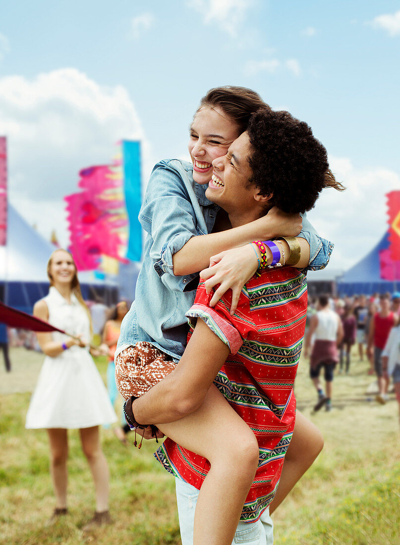 Enthusiastic couple hugging