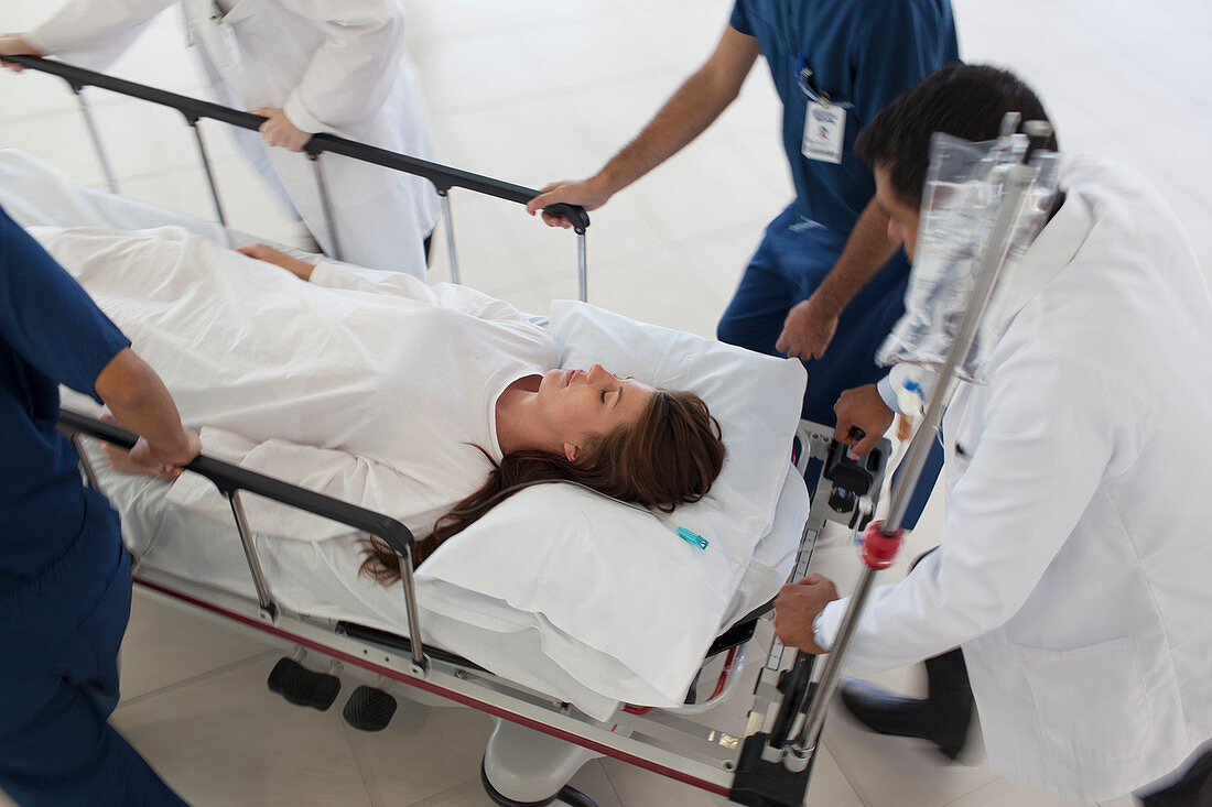 Hospital staff rushing patient