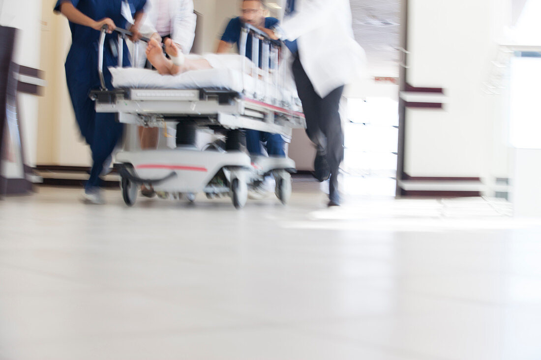 Hospital staff rushing patient