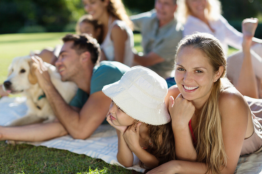 Family relaxing in backyard