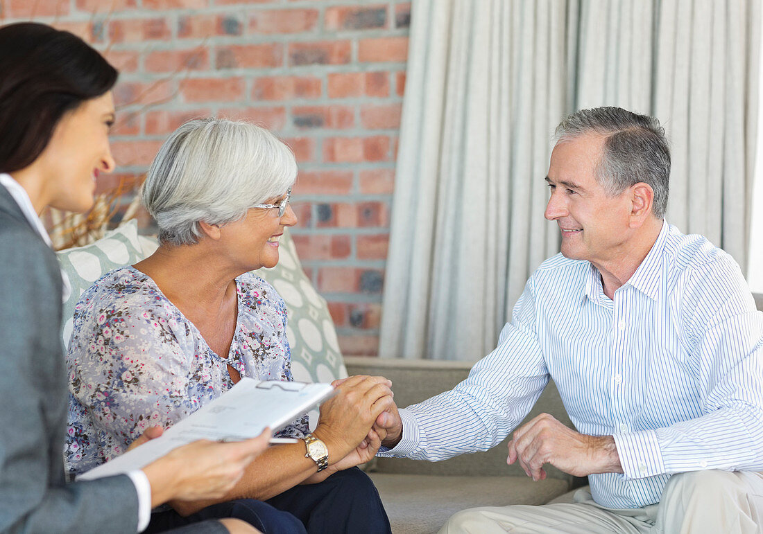 Financial advisor talking to couple