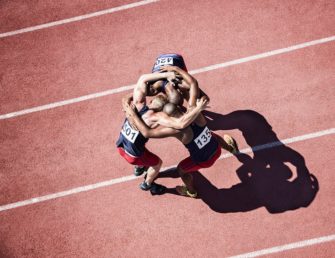 Runners huddled on track