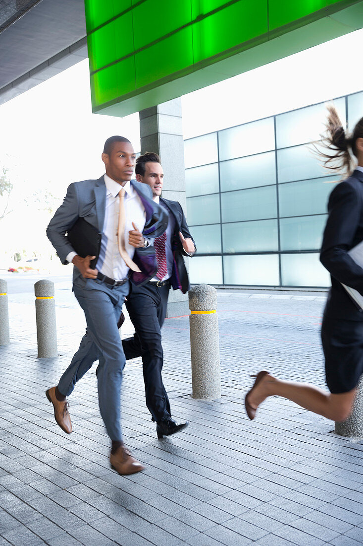 Business people running