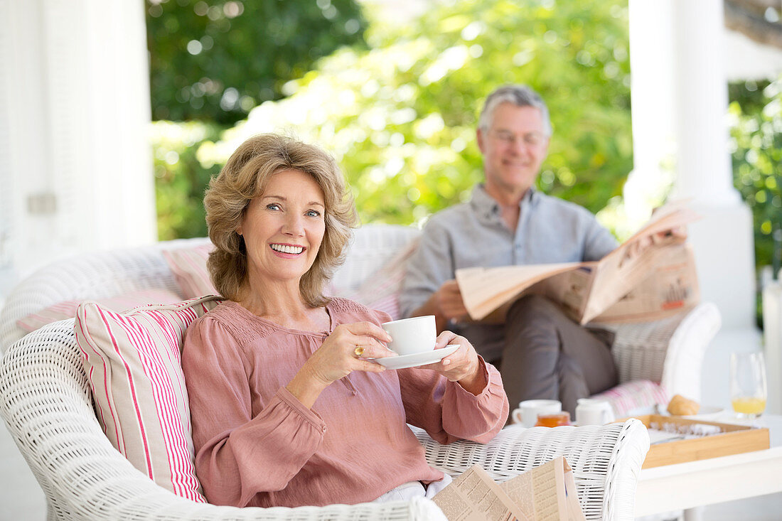 Senior couple relaxing on patio