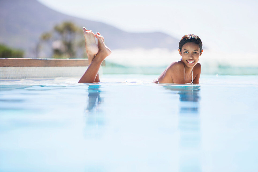 Couple relaxing in swimming pool