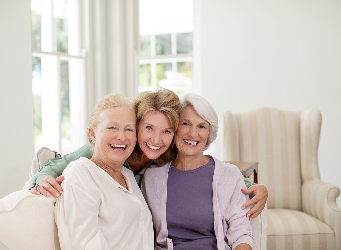 Smiling senior women in living room