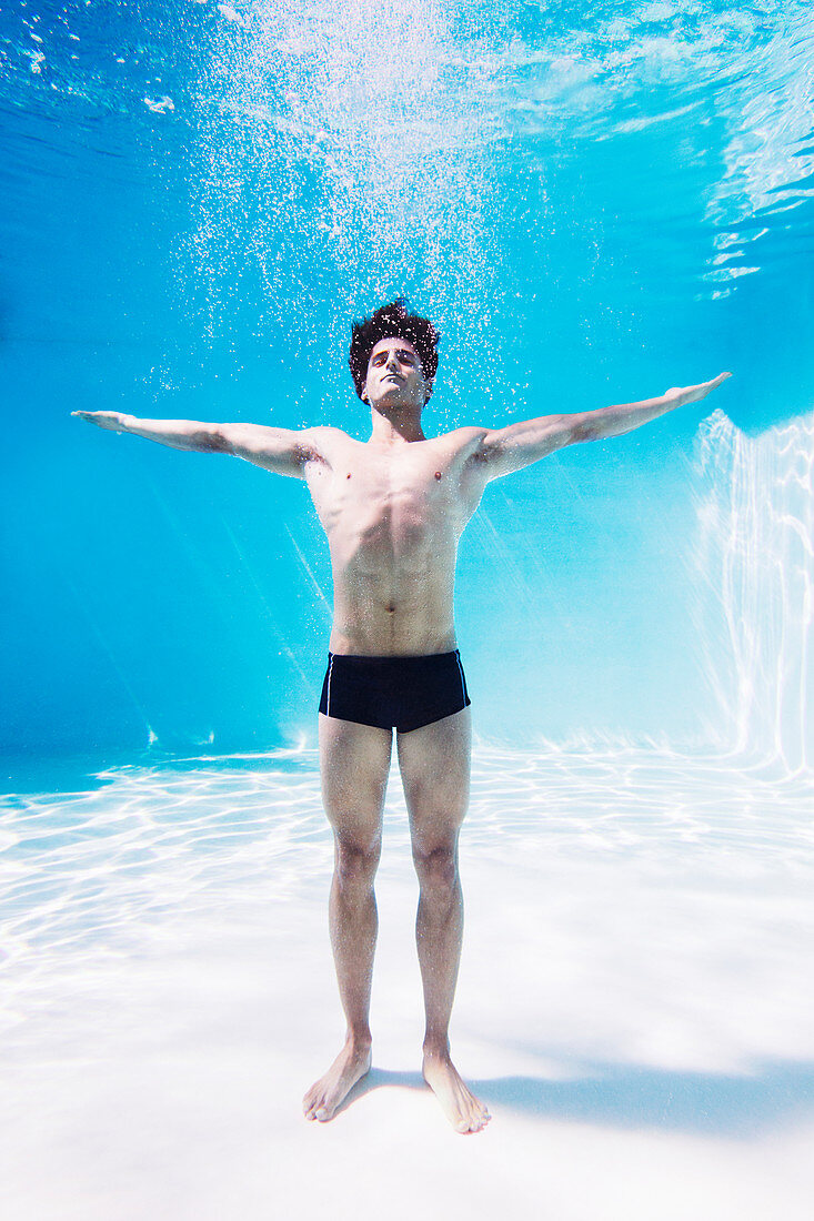 Man standing underwater