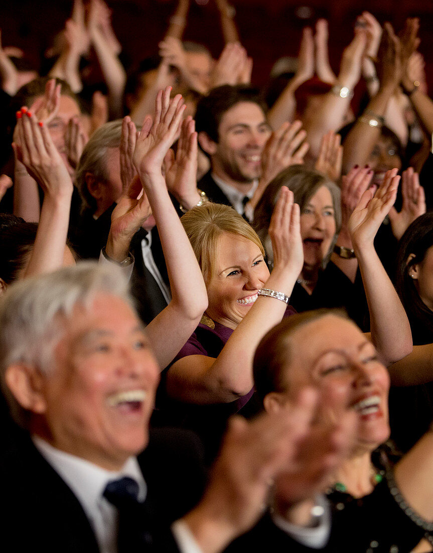 Audience clapping in theatre