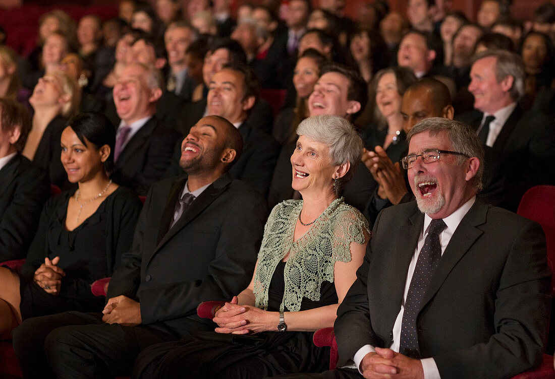 Laughing theatre audience