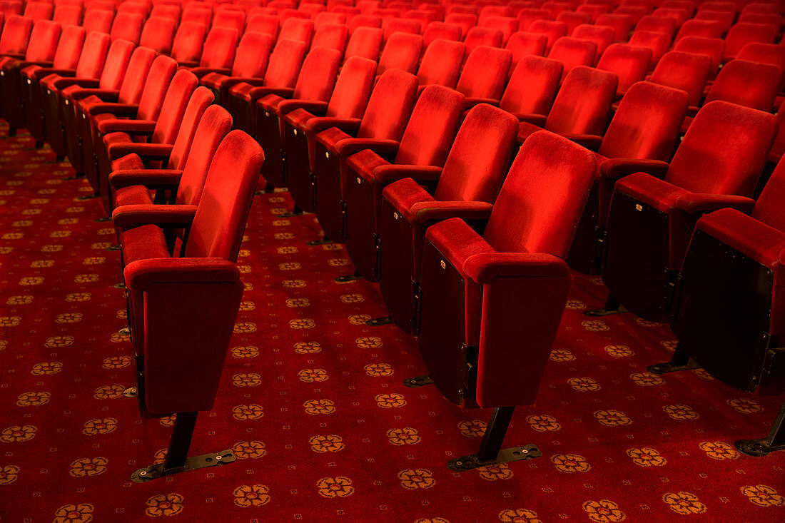 Seats in empty theatre auditorium