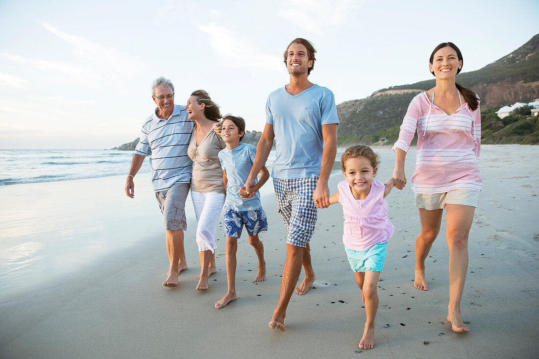 Family walking together on beach