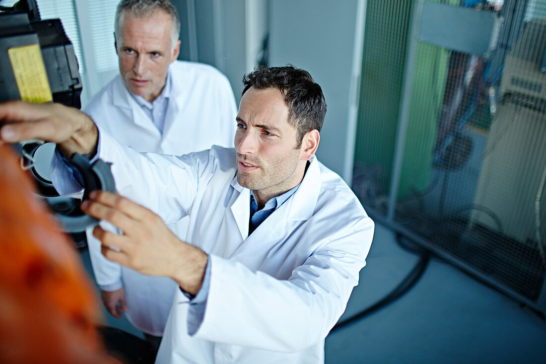 Scientists working in laboratory