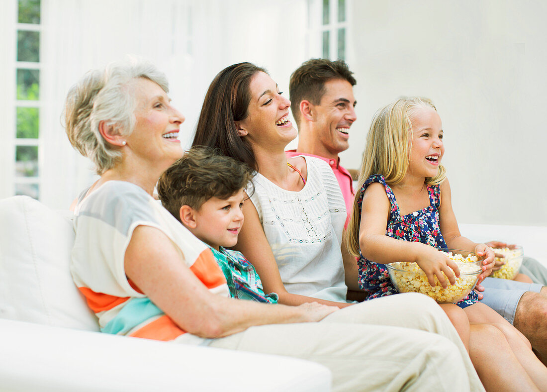 Family watching television together