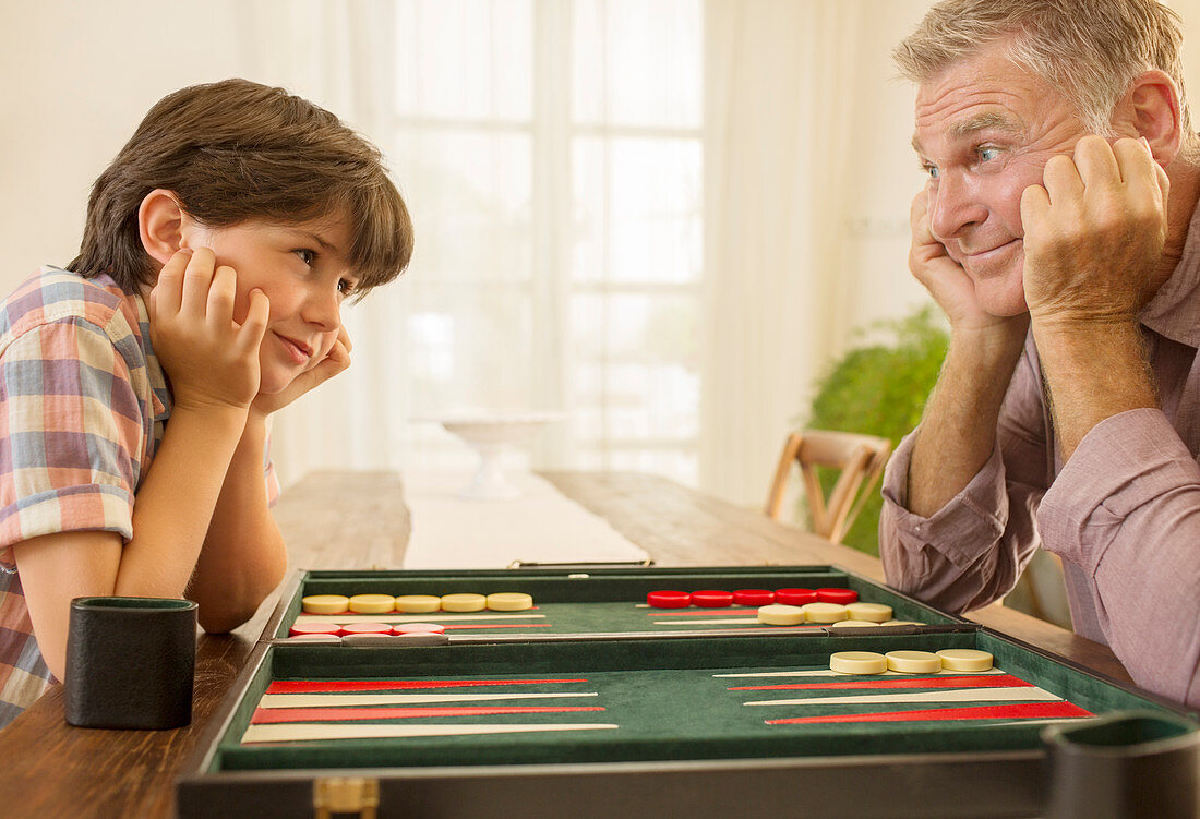 Grandfather and grandson playing