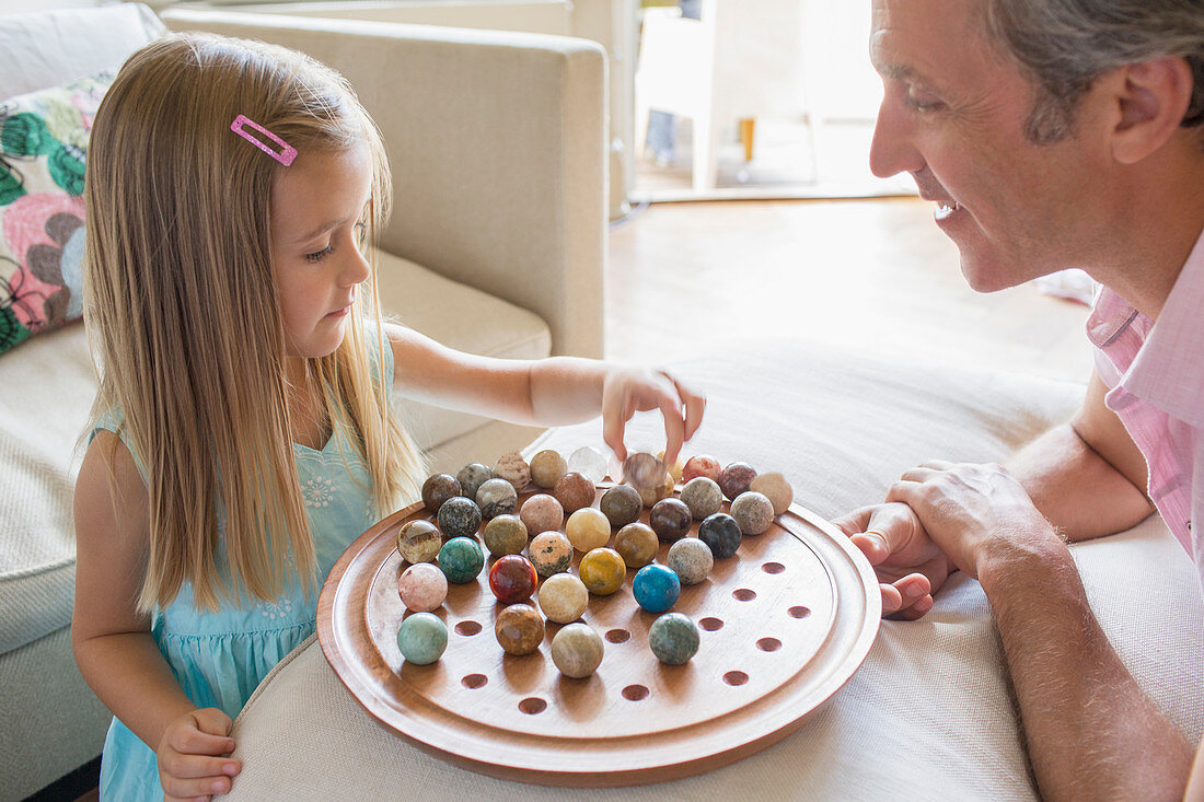 Father and daughter playing