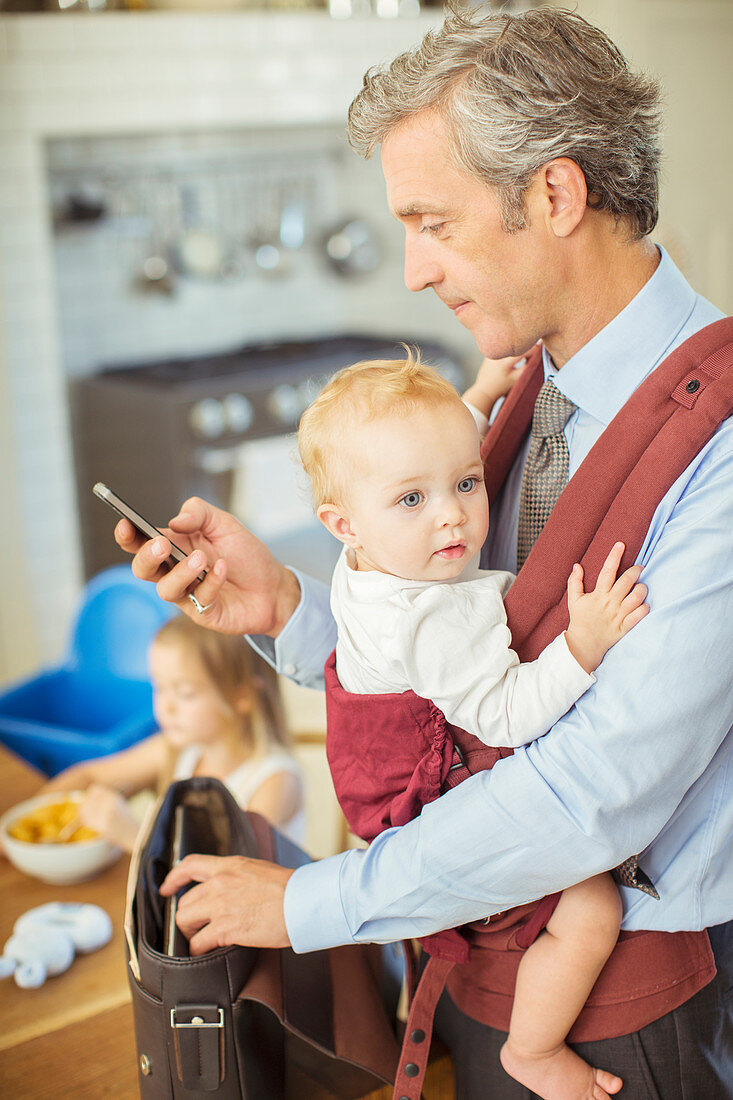 Father holding baby